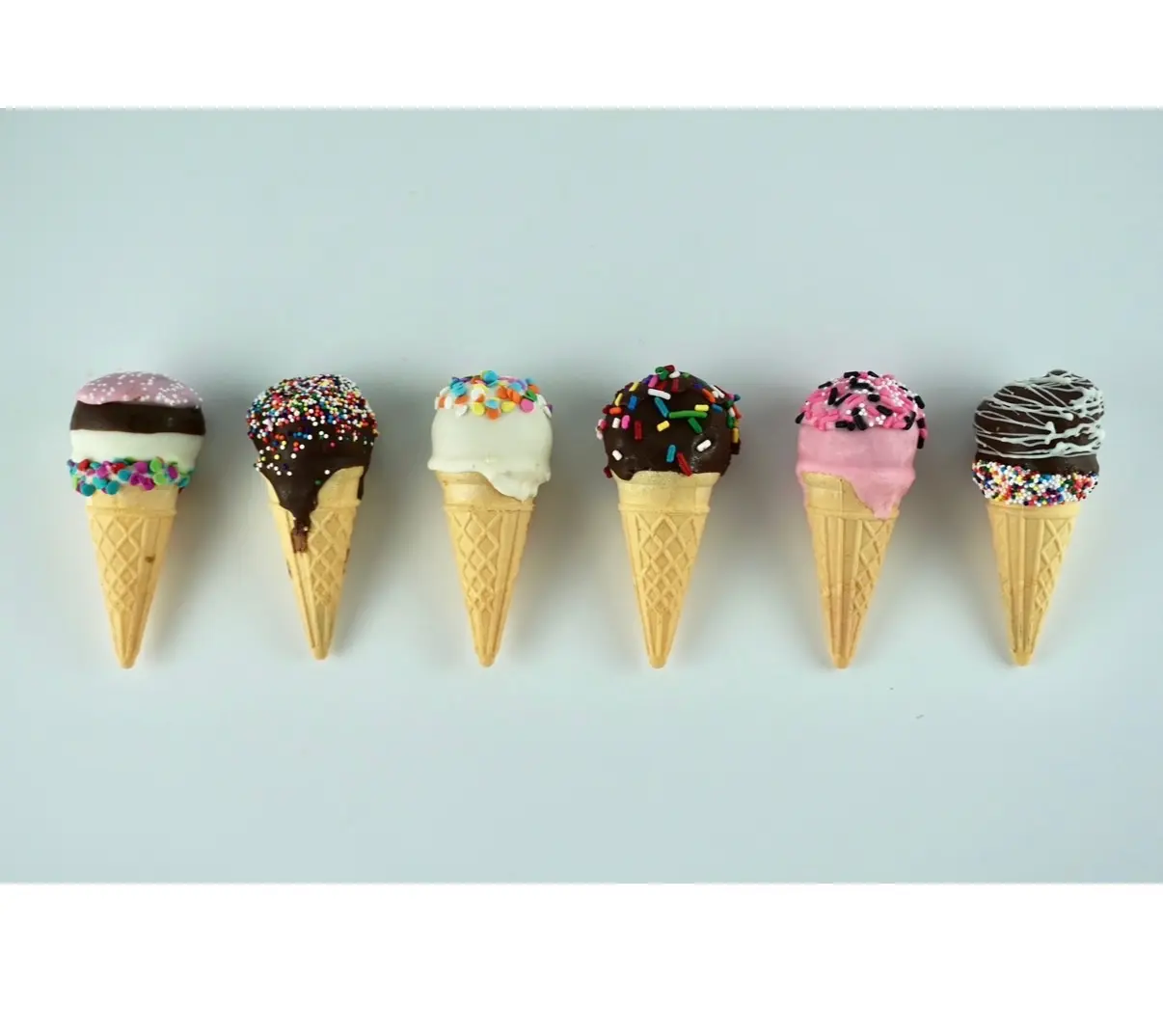 Daisy Dip cones decorated with sprinkles